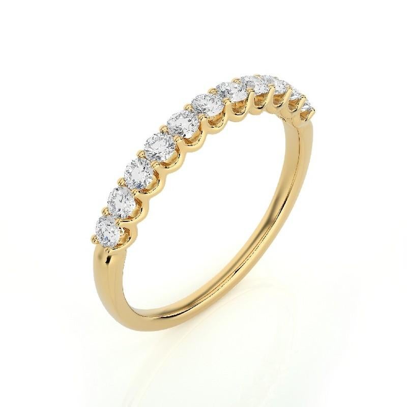 Diamond Total Carat Weight: This elegant 1981 Classic Collection half eternity ring features a total carat weight of 0.5 carats, showcasing 11 brilliant round diamonds set in a classic prong setting.

Gold Purity: Crafted with precision in luxurious