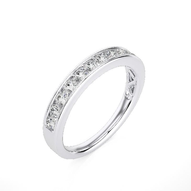 Diamonds: Twelve meticulously selected round diamonds grace this wedding ring, each securely set in a classic channel setting, creating a seamless and continuous shimmer. The total carat weight of 0.5 carats ensures a captivating and enduring