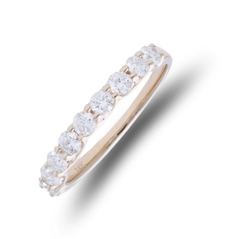 Diamond Total Carat Weight: This elegant 1981 Classic Collection wedding band ring features a total carat weight of 0.73 carats, showcasing 10 brilliant round diamonds that radiate exquisite sparkle and sophistication.

Gold Purity: Crafted with