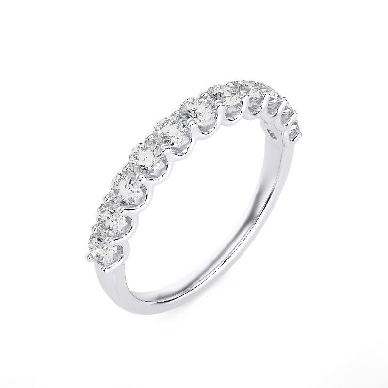 Diamond Total Carat Weight: This elegant 1981 Classic Collection wedding band ring features a total carat weight of 0.8 carats, showcasing 11 brilliant round diamonds that radiate exquisite sparkle and sophistication.

Gold Purity: Crafted with