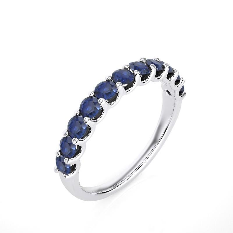 Sapphire Total Carat Weight: This exquisite 1981 Classic Collection wedding ring features a total carat weight of 1.2 carats, showcasing 11 stunning round sapphires that radiate deep blue hues and timeless beauty.

Gold Purity: Crafted with
