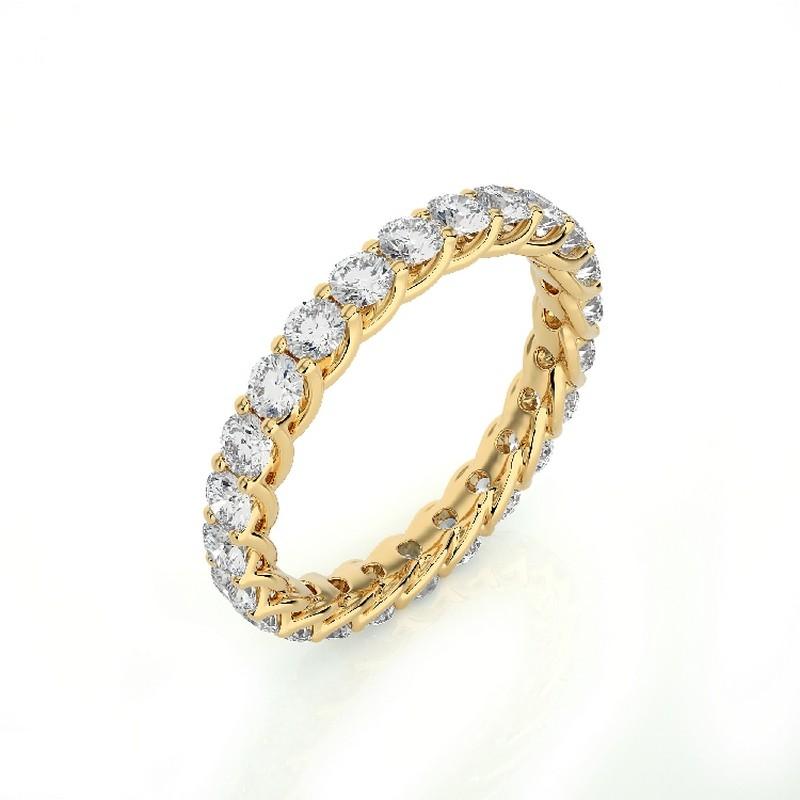 Diamond Total Carat Weight: This elegant 1981 Classic Collection wedding band ring features a total carat weight of 1.5 carats, showcasing 24 excellent round diamonds that radiate exquisite sparkle and sophistication.

Gold Purity: Crafted with