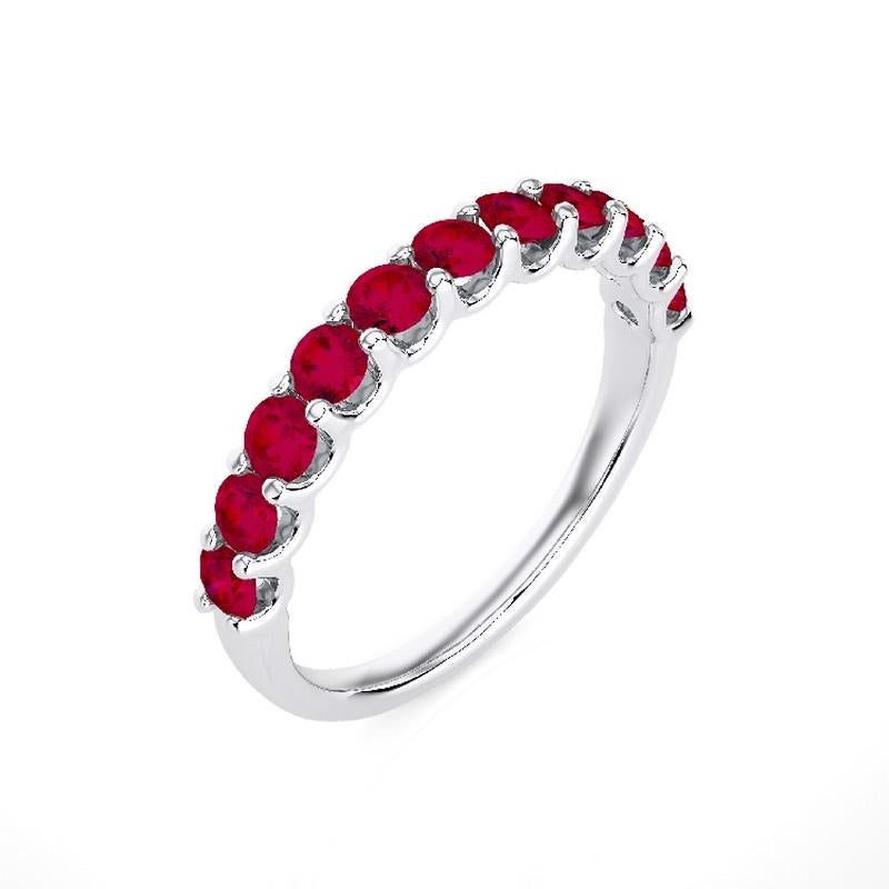 Ruby Total Carat Weight: This exquisite 1981 Classic Collection wedding ring features a total carat weight of 1.2 carats, showcasing 11 stunning round rubies that exude rich red hues and timeless beauty.

Gold Purity: Crafted with precision in