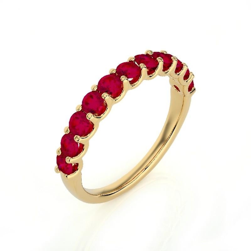 Ruby Total Carat Weight: This exquisite 1981 Classic Collection wedding ring features a total carat weight of 1.2 carats, showcasing 11 stunning round rubies that exude rich red hues and timeless beauty.

Gold Purity: Crafted with precision in
