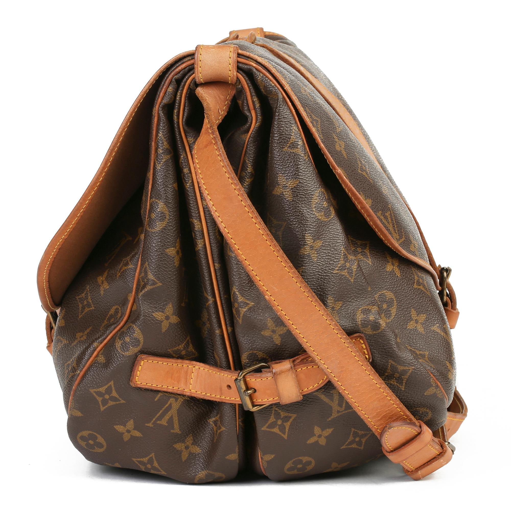 LOUIS VUITTON
Brown Monogram Coated Canvas Vintage Samur 356

Xupes Reference: HB3778
Serial Number: 881.V.I
Age (Circa): 1981
Authenticity Details: Date Stamp (Made in France) 
Gender: Ladies
Type: Shoulder, Crossbody 

Colour: Brown
Hardware: