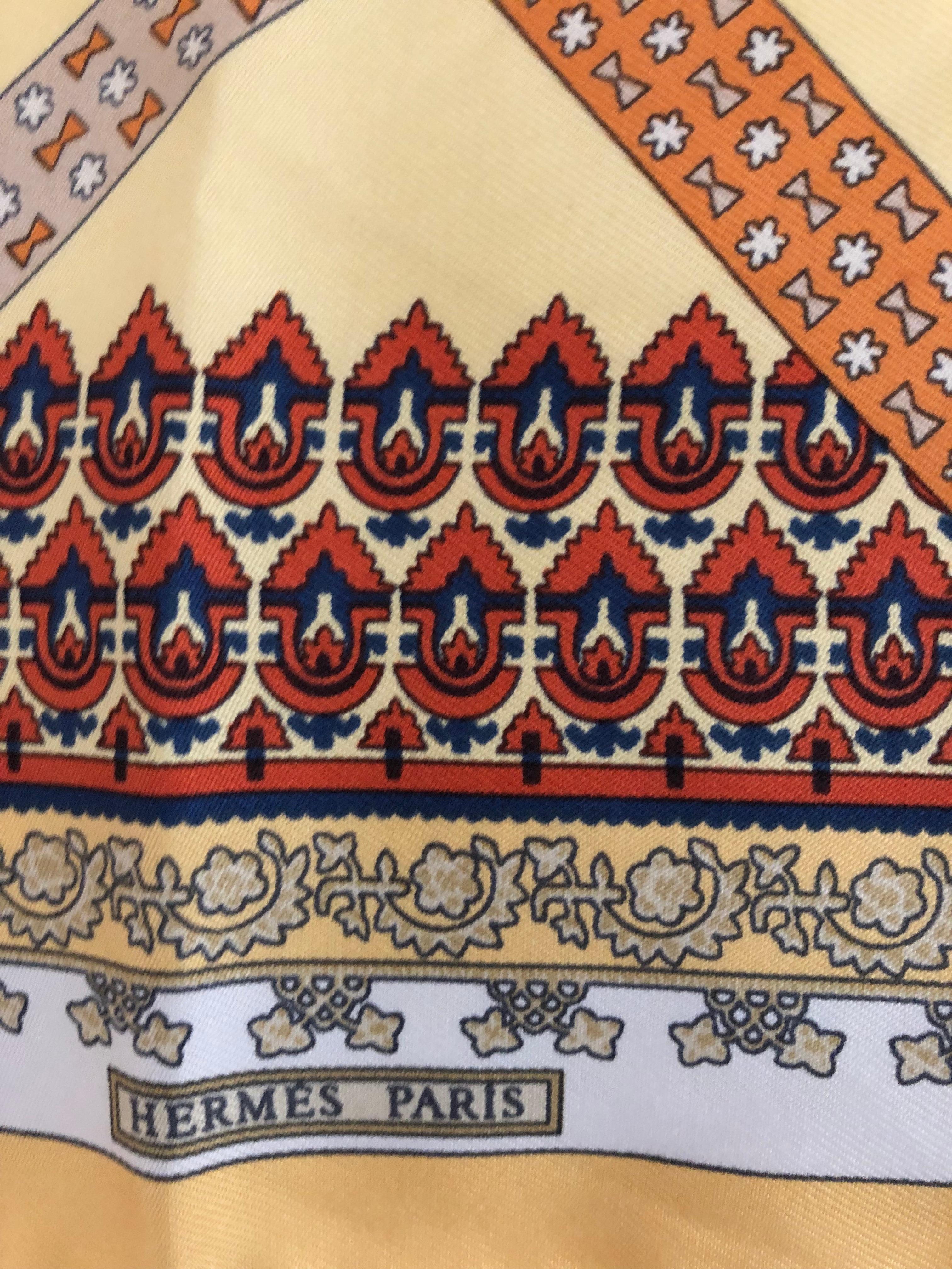 Julie Abadie is the designer for this lovely Hermes silk square with graphics that remind one of Middle Eastern architectural elements. The hand rolled hems are nice and plump and the care tag is present.