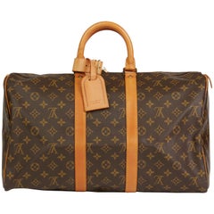 1982 Louis Vuitton Brown Monogramm beschichtetes Segeltuch & Vachetta Vintage Keepall 45
