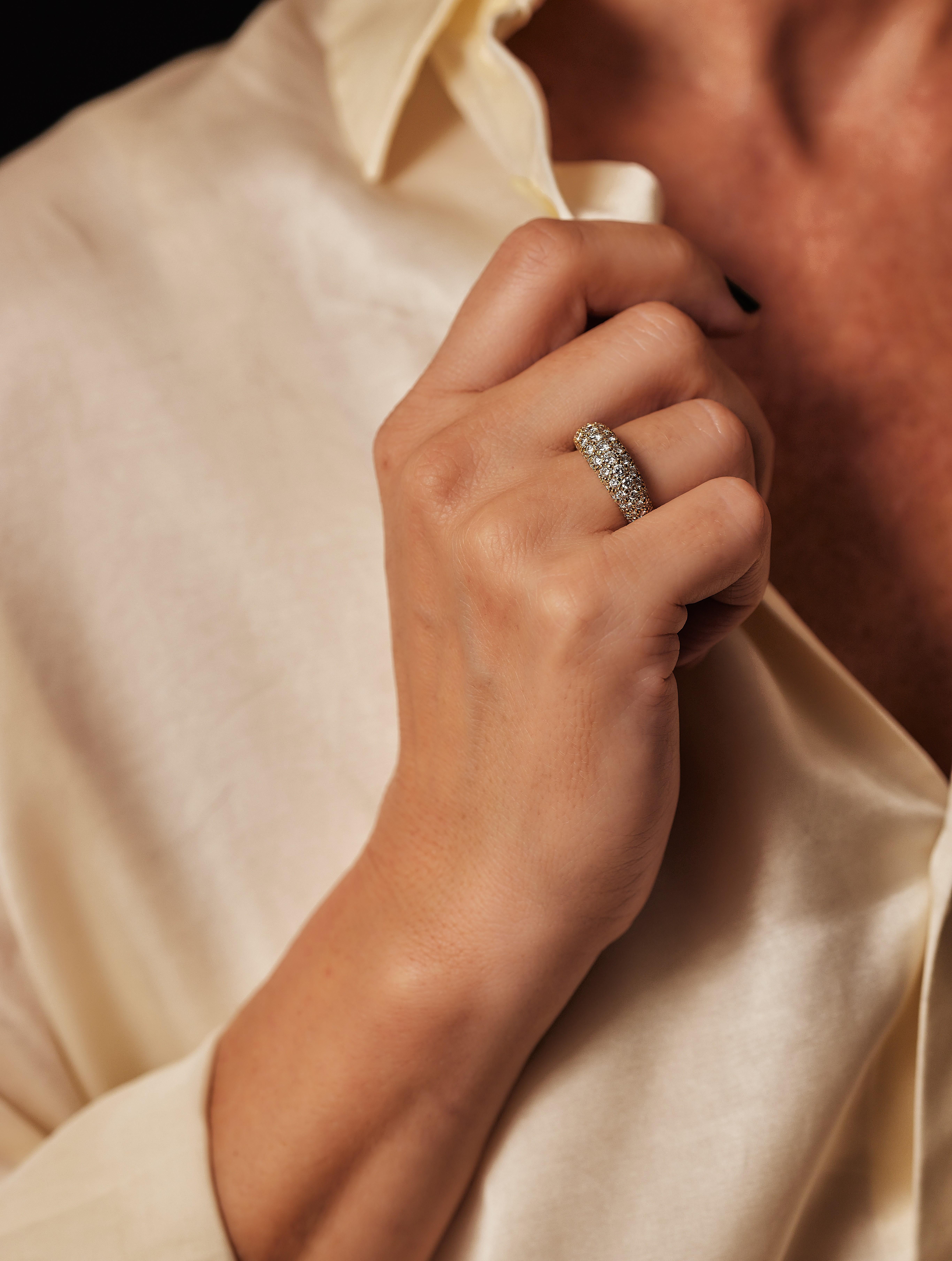 An 18k curved dome yellow gold band ring, partially pavé-set with brilliant-cut diamonds. Signed VCA and numbered, with maker’s mark for the workshop of Péry et Fils. 

Gross weight: 5.2 g. 
Ring size: 7.5us / O½ / P / 17.75 / 55.5. 

The band