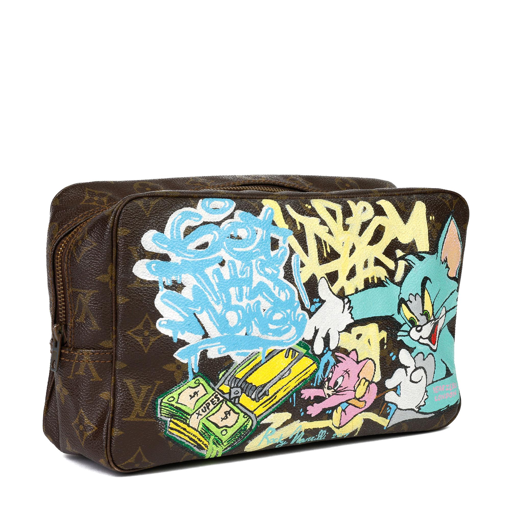 LOUIS VUITTON
Hand-painted 'Get This Money' X Year Zero London Toiletry Pouch

Xupes Reference: CB327
Serial Number: 833
Age (Circa): 1983
Authenticity Details: Date Stamp (Made in France)
Gender: Ladies
Type: Travel, Accessory

Colour: Multi
