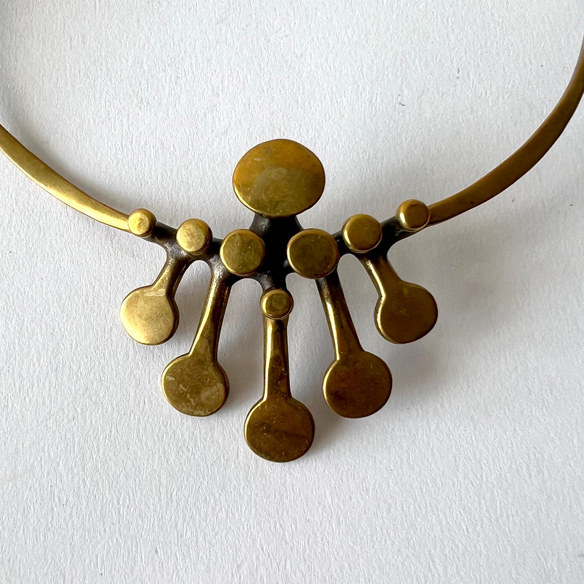 Hand wrought bronze necklace created by Richard Lawless.  Necklace has an 18
