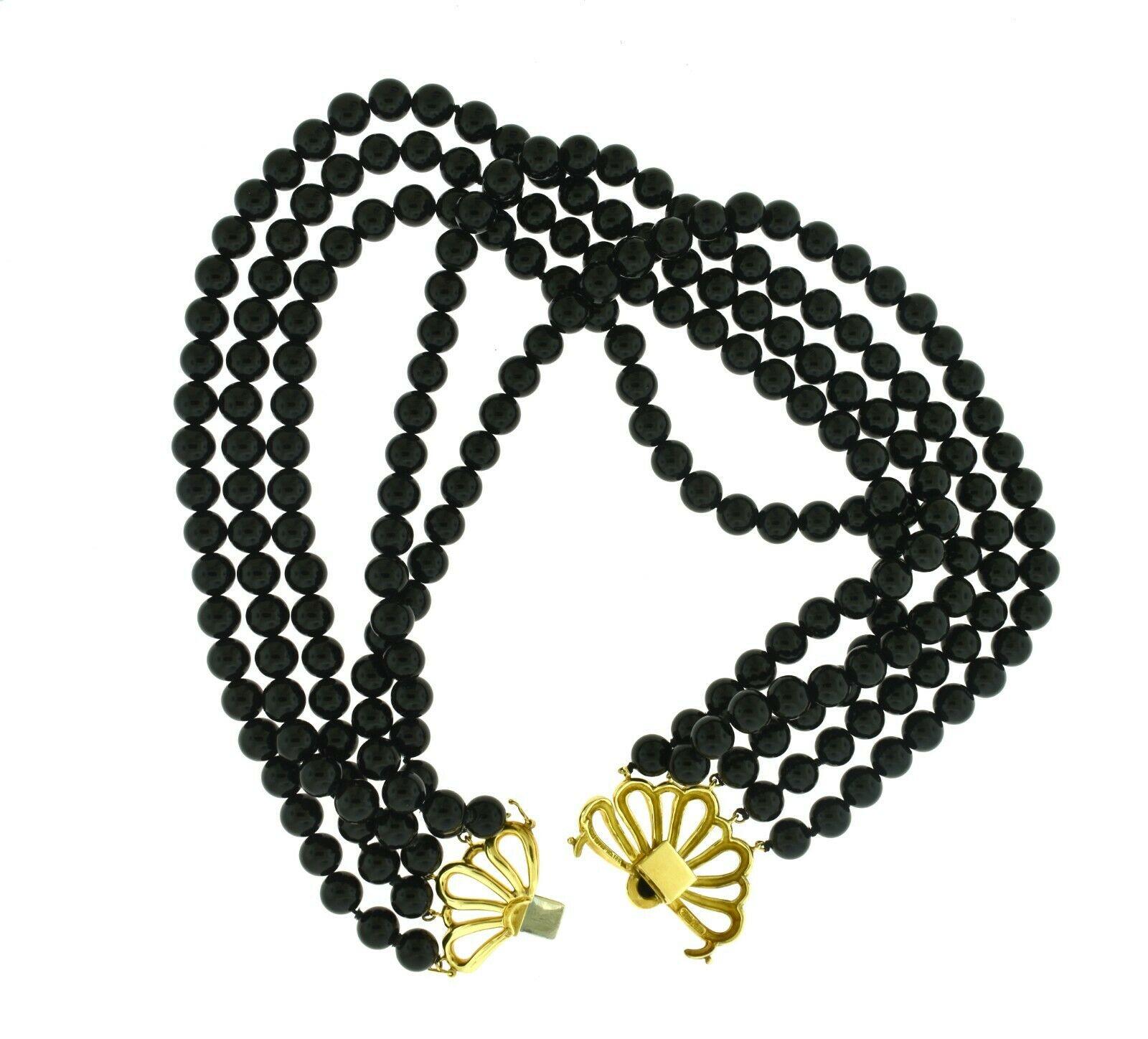 Brilliance Jewels, Miami
Questions? Call Us Anytime!
786,482,8100

Designer: Tiffany & Co.

Collection: Paloma Picasso for Tiffany & Co

Year:1983

Style: Choker/ Necklace 

Metal: Yellow Gold 

Stones: Oval Cabochon Onyx 

Flower Measurement: