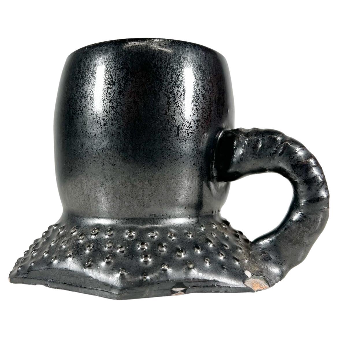Vintage-Keramik-Kunst, schwarzer Einzel-Kaffeekrug, signiert Melching