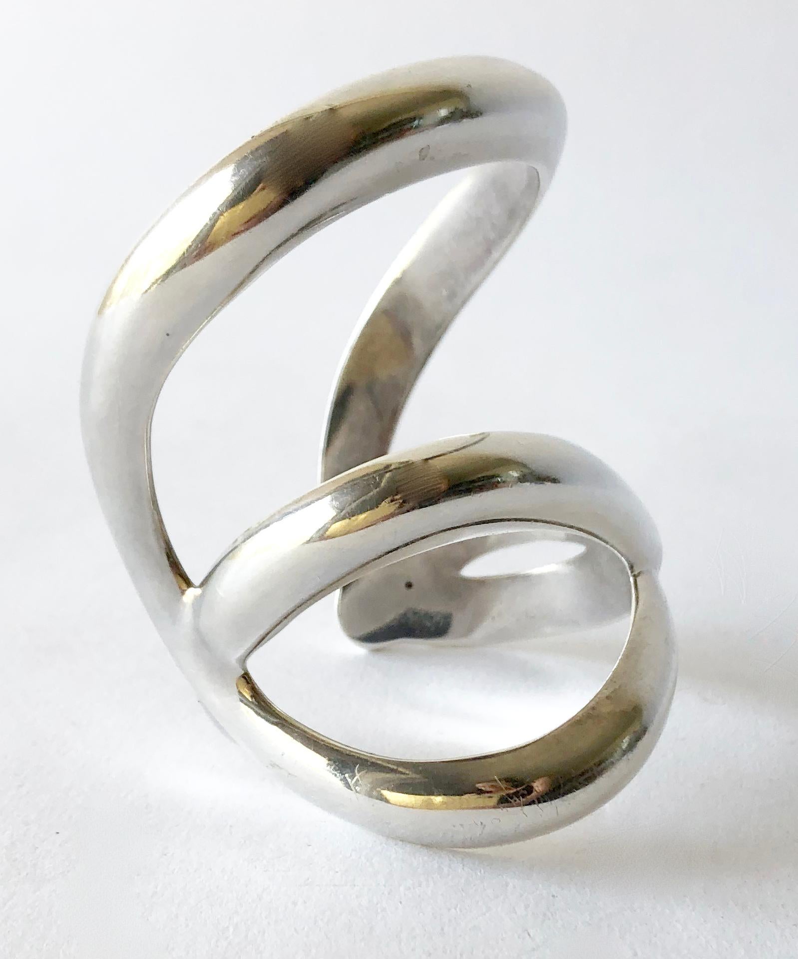 Super wide cuff bracelet of solid sterling silver created by Angela Cummings circa 1984.  Cuff measures 2 2/4