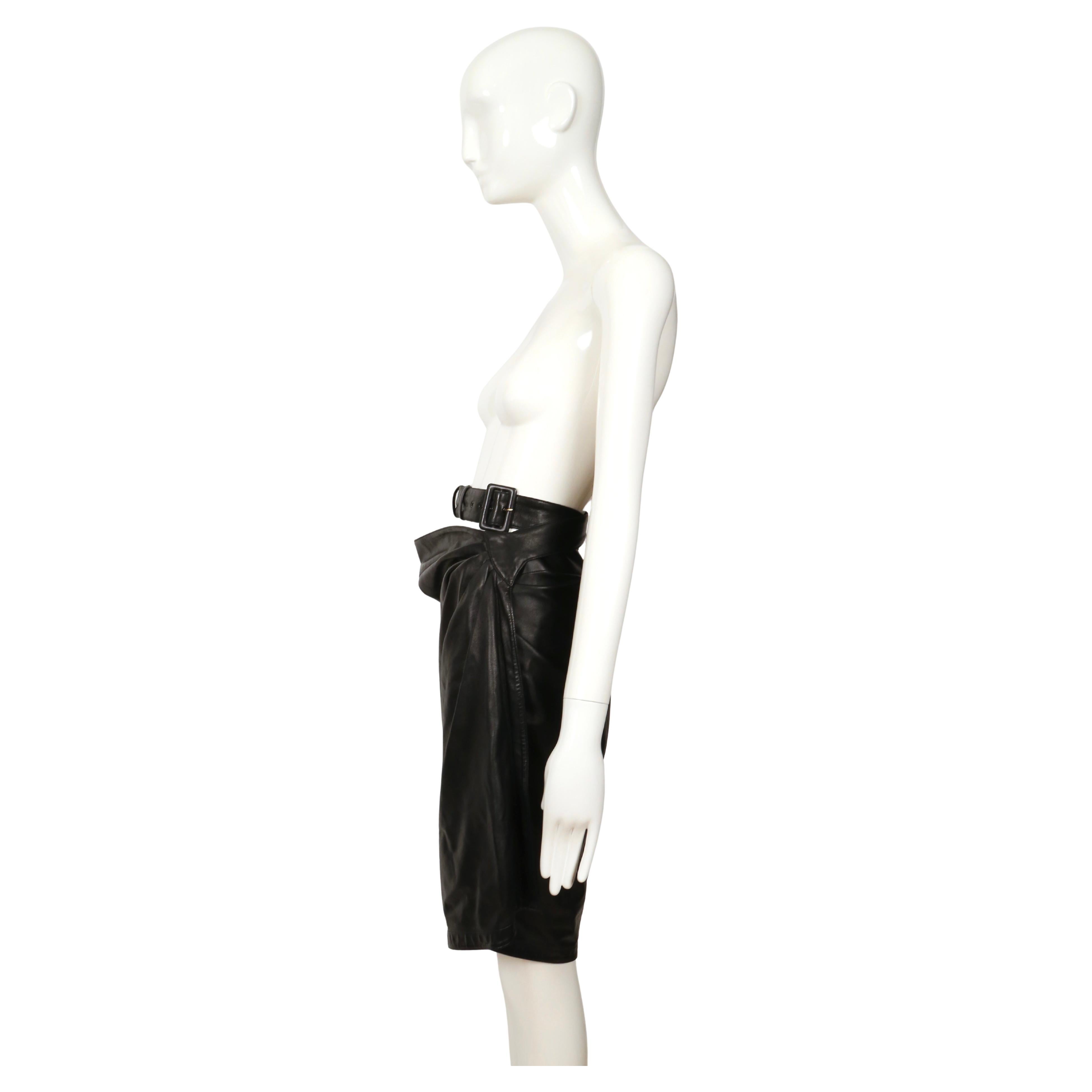Women's or Men's 1984 AZZEDINE ALAIA black leather wrap skirt with side buckle For Sale