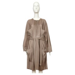 Veste-pull AZZEDINE ALAIA de 1984, en maille taupe, modèle « RUNWAY », avec cordon à nouer à la taille