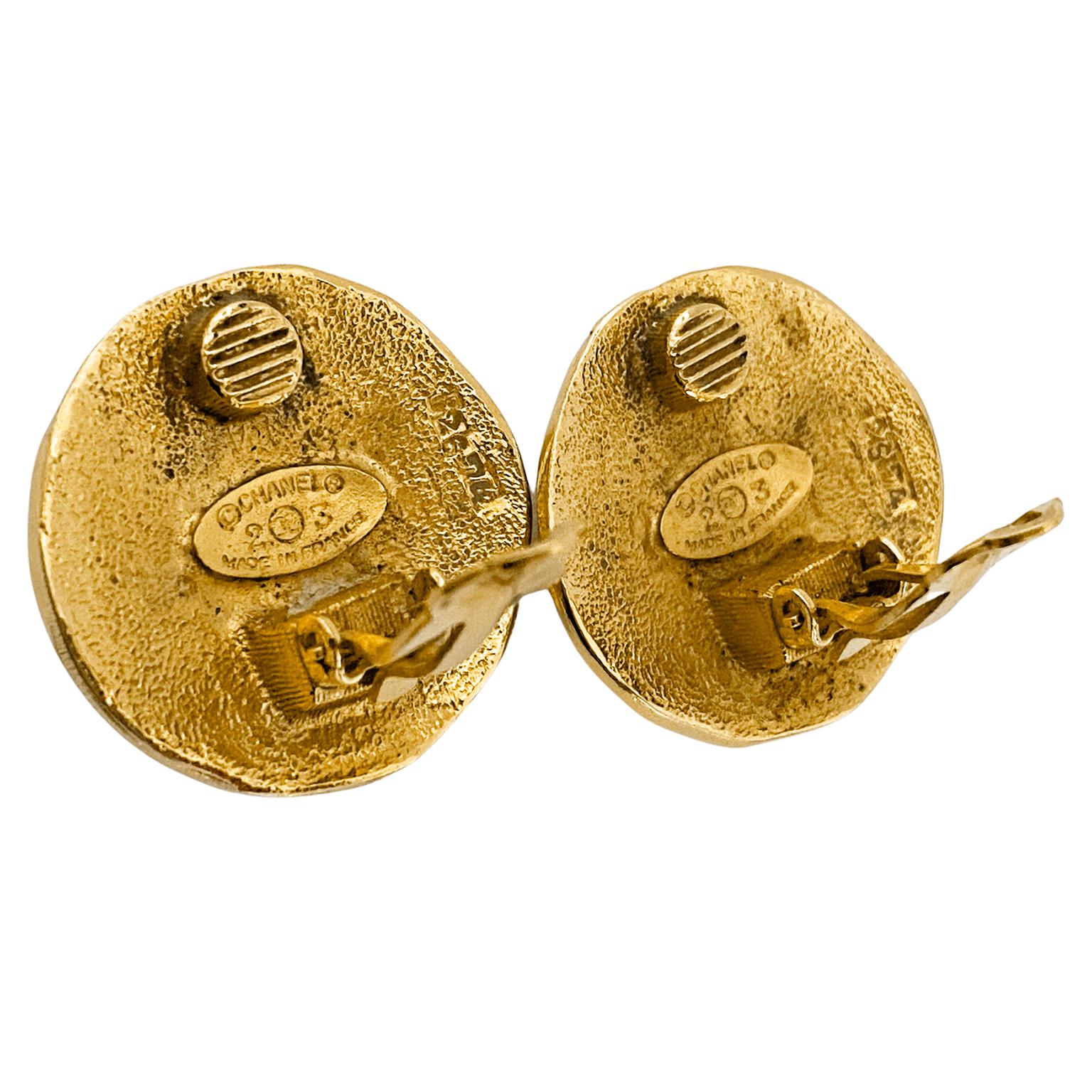 Beautiful Chanel gold tone clip on earrings featuring a lion motif and the Chanel brand markings. Back brand plaques are stamped collection 23, dating these earrings to 1984, the first year that Karl Largerfeld hired Victoire de Castallane to design