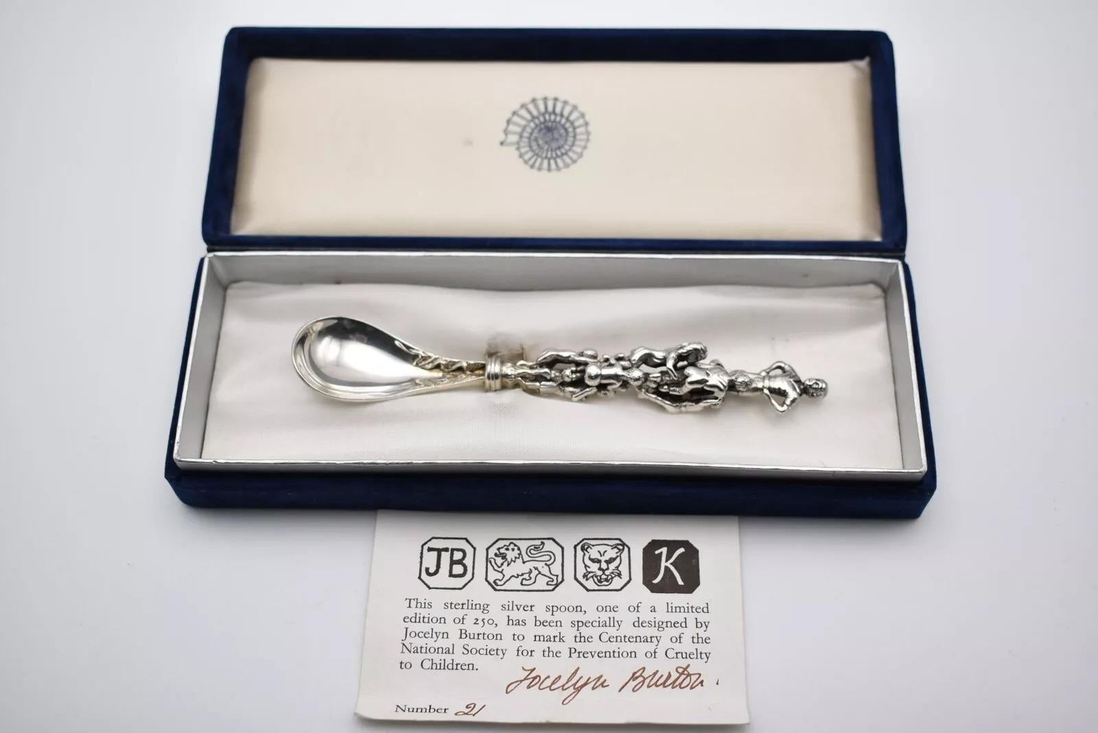 This sterling silver spoon, crafted by the renowned silversmith Jocelyn Burton in 1984, is a special limited edition piece made to celebrate the 100th anniversary of the National Society for the Prevention of Cruelty to Children (NSPCC). Being