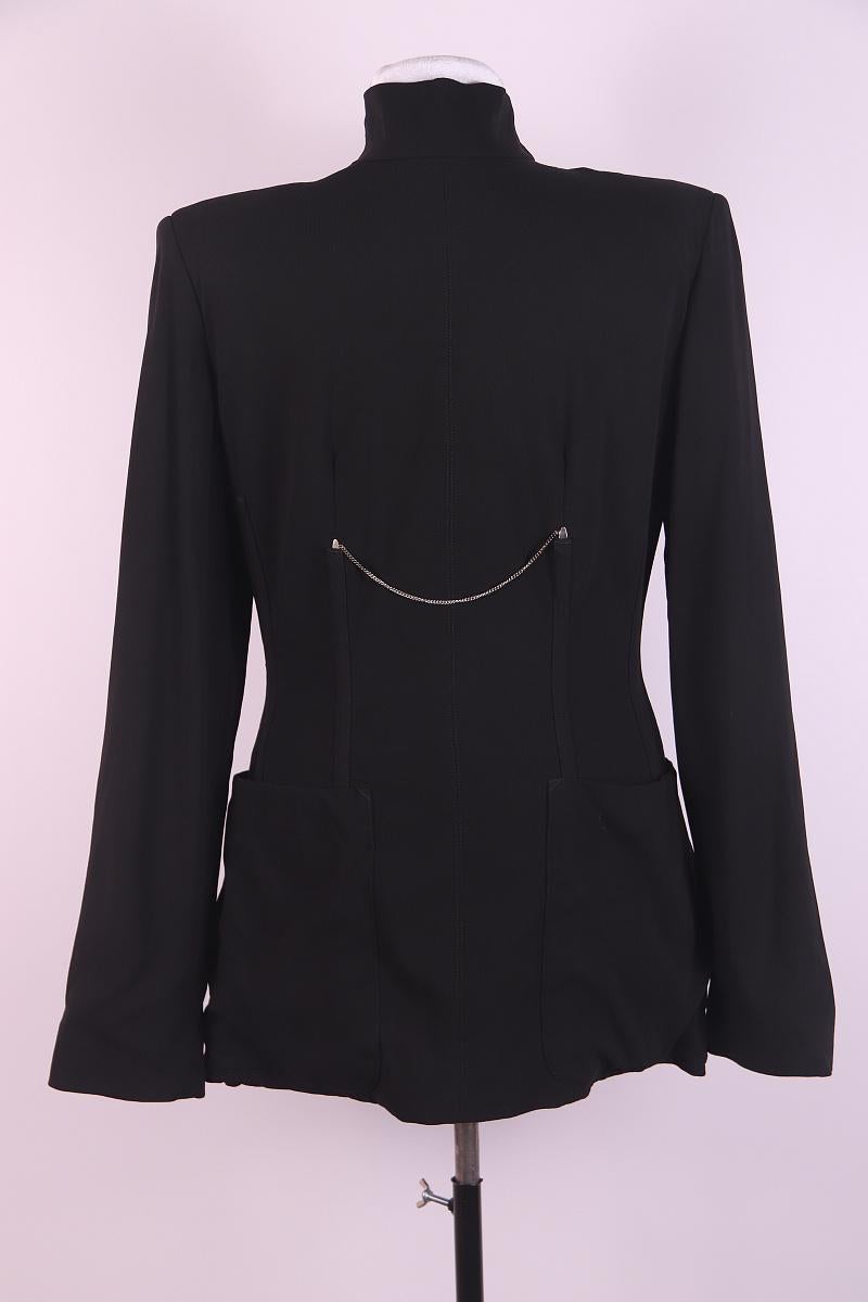 1985 1986 JEAN PAUL GAULTIER REEDITION black wool crepe jacket Minautore


JEAN PAUL GAULTIER REEDITION black wool crepe jackett with Minautore lining


The interior is lined with a red acetate blend with a yellow Minautaur head design on the
