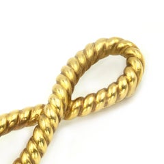 1985 CUMMINGS 18k yellow gold 2-Diamond Twisted Rope Ribbon Brooch