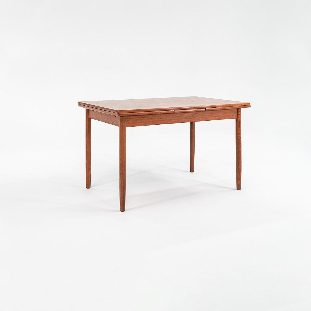 1985 Danish Teak Extension Dining Table in the Ansager Mobler Style In Good Condition For Sale In Philadelphia, PA
