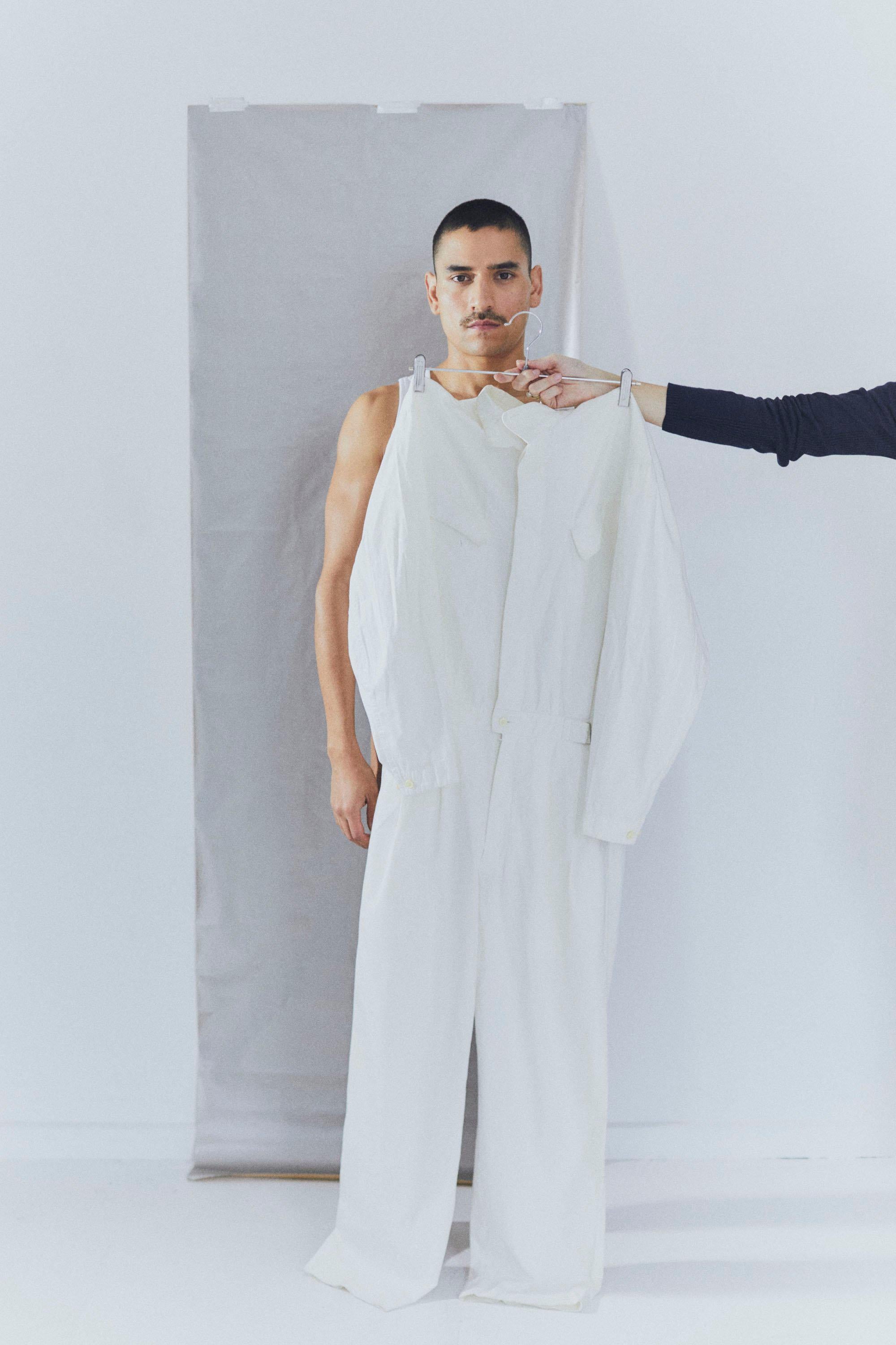 1985 Issey Miyake jumpsuit. Full button upper. Mutable collar. Belted detail. Straight fit. Iconic. 
Ecru / White. Very good condition.