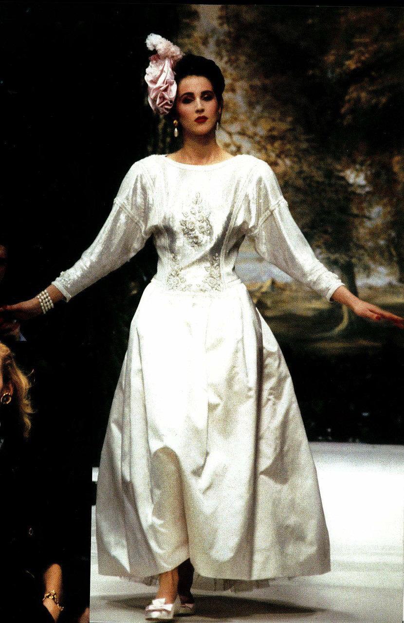 Chanel is known to be one of the most luxurious and decadent fashion houses in the world. This breathtaking ivory-white formal gown, from head designer Karl Lagerfeld's 1985 collection, is a perfect example of why this couture brand has stood the
