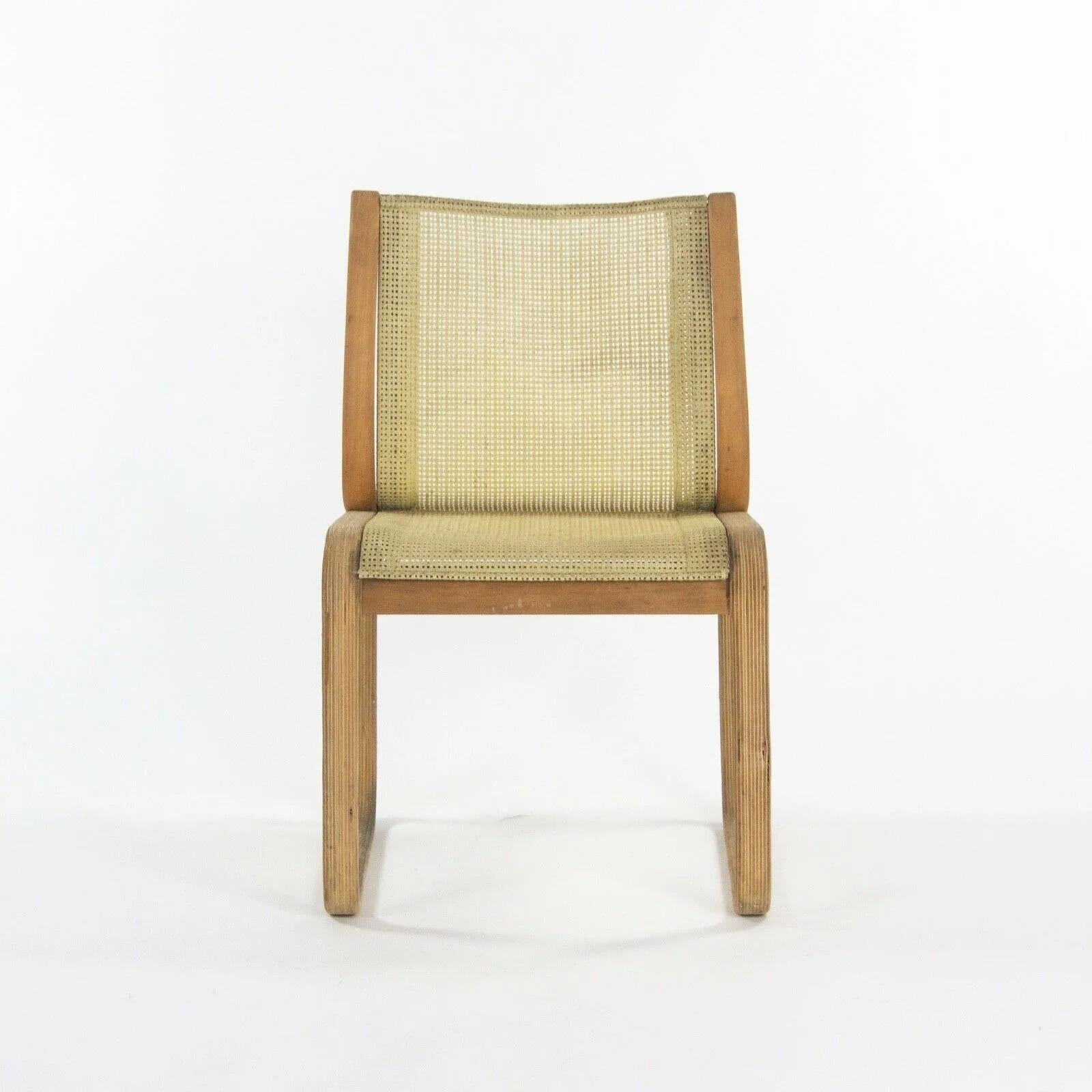 Listed for sale is a Richard Schultz Wooden Outdoor Collection dining chair prototype, dating to circa 1985. This is a marvelous and rare example. The frame is in very good shape with some light wear. The chair is constructed from bent wood with a