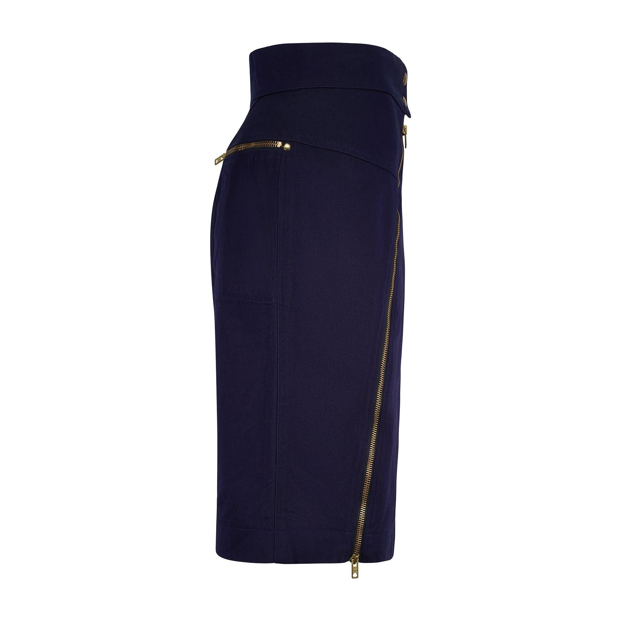 This skirt was created as part of Azzedine Alaia's Spring 1986 collection and is one of the most memorable collections of his career. Tailored from thick smooth cotton that recalls French workwear styles, this elegant pencil skirt is in the indigo