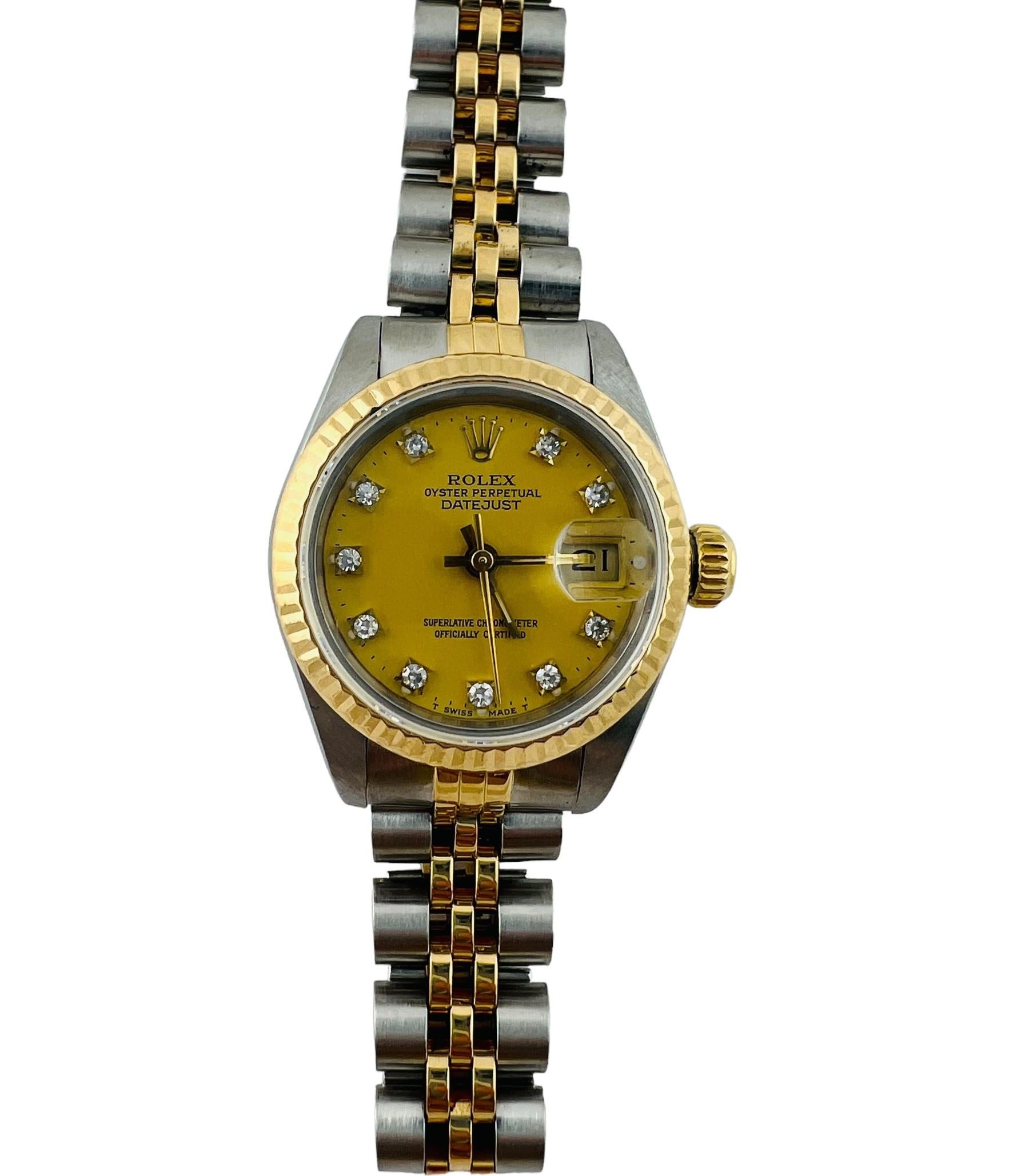 1986 Rolex Ladies Two Tone Datejust Watch

Model: 69173
Serial: 9309549

Rolex factory champagne diamond dial with 18K yellow gold bezel

26mm case

Automatic movement

Tow tone jubilee band - stretch to band as shown. Fits up to 7.25