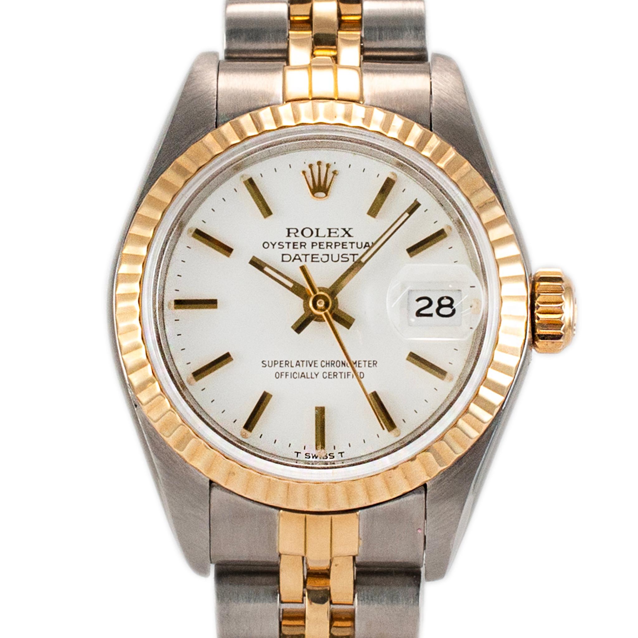Brand: Rolex

Gender: Ladies

Metal Type: 18K Yellow Gold & Stainless Steel 

Diameter:  26.00 mm

Weight: 54.11 Grams

One ladies 18K yellow gold and stainless steel ROLEX Swiss made watch. The metals were tested and determined to be 18K yellow
