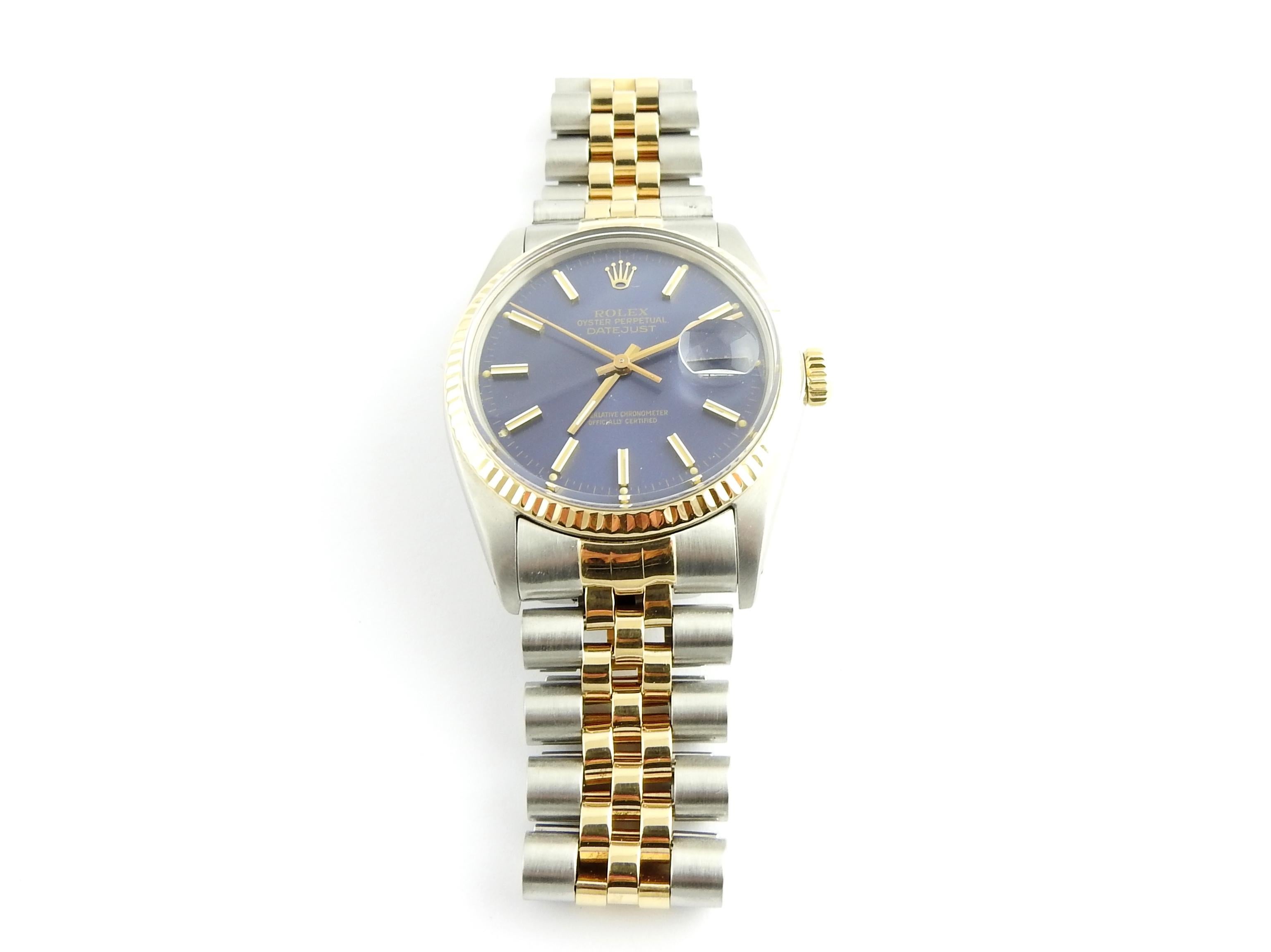 1986 Rolex Men's Watch

Model: 16013

Serial: 9007376

This authentic Rolex Oyster Perpetual Date Just Watch has a 36mm case

Automatic movement

Blue Dial with gold markers

18K Yellow Gold Bezel

Stainless and yellow gold band. Some stretch to
