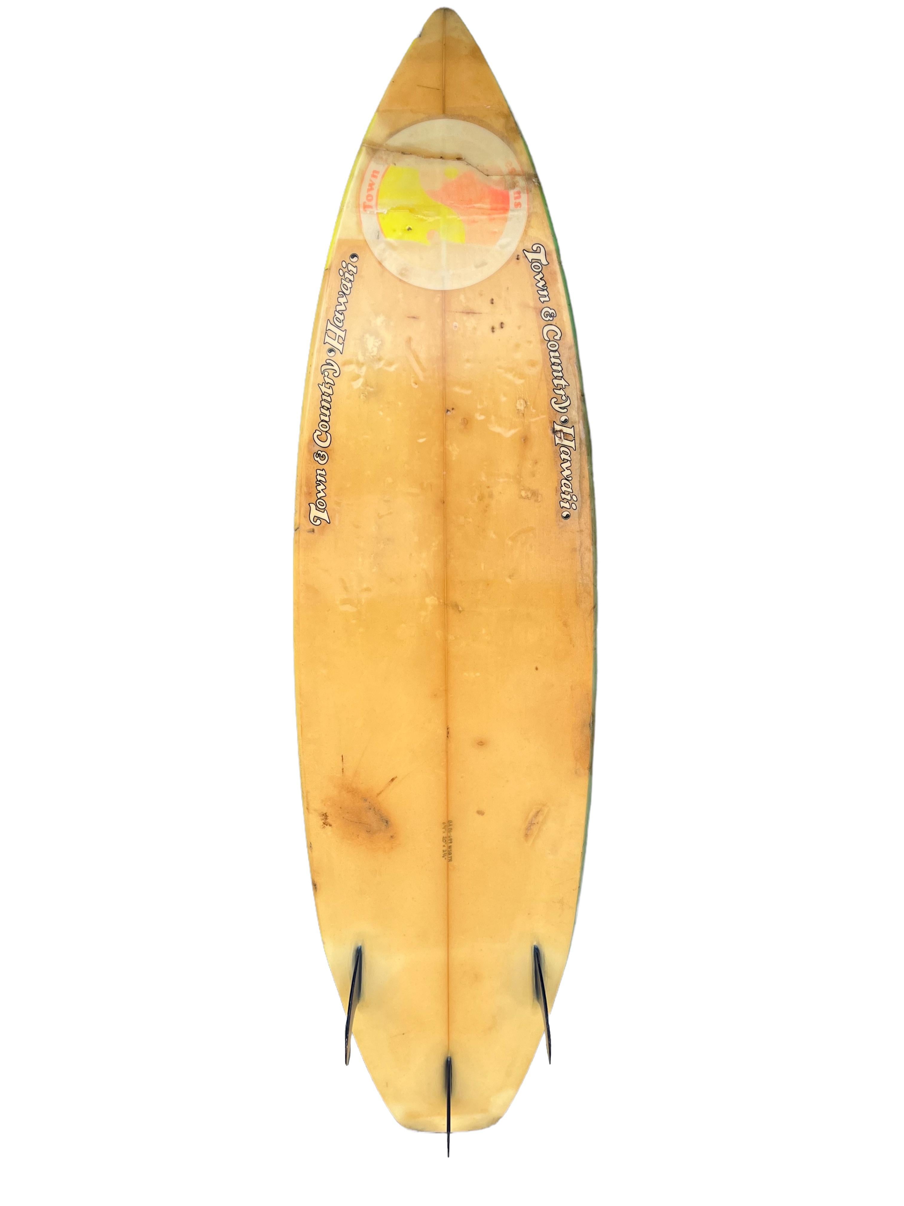 1986 Town & Country shortboard made by the late Ben Aipa (1942-2021). Features experimental screen printed photo sequence of professional surfer Martin “Pottz” Potter surfing. 1 of just 3 examples known to exist. Airbrush artist Gavin Hasegawa was