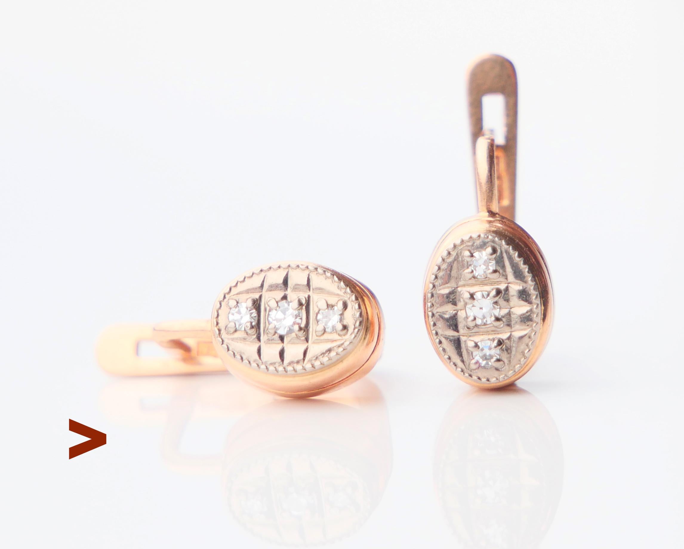 Ein Paar ukrainischer Vintage-Diamanten  Ohrringe mit Foldes-Haken.

Teile aus massivem 14-karätigem Roségold mit Oberteil aus Weißgold. Jeder Ohrring ist mit einem Satz sowjetischer ukrainischer Standardpunzen versehen: Stern mit Hammer und Sichel,