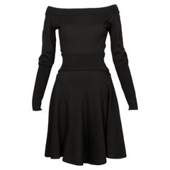 Robe AZZEDINE ALAIA de 1987, en laine noire, modèle « RUNWAY », avec encolure tombante, taille S/M