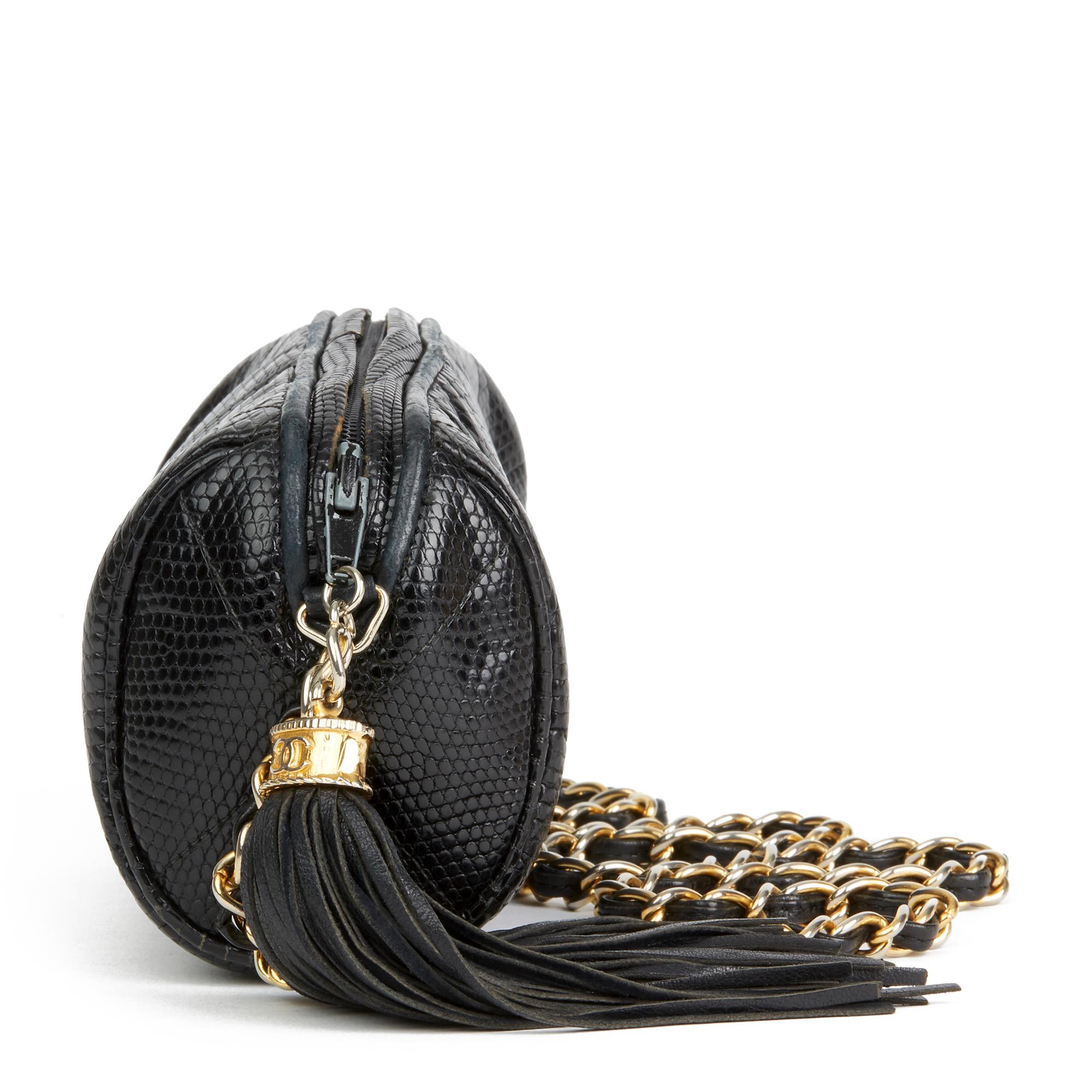 CHANEL
Black Quilted Lizard Leather Vintage Timeless Fringe Shoulder Pochette

Reference: HB2757
Serial Number: 0874691
Age (Circa): 1987
Authenticity Details: Serial Sticker (Made in Italy)
Gender: Ladies
Type: Shoulder

Colour: Black
Hardware: