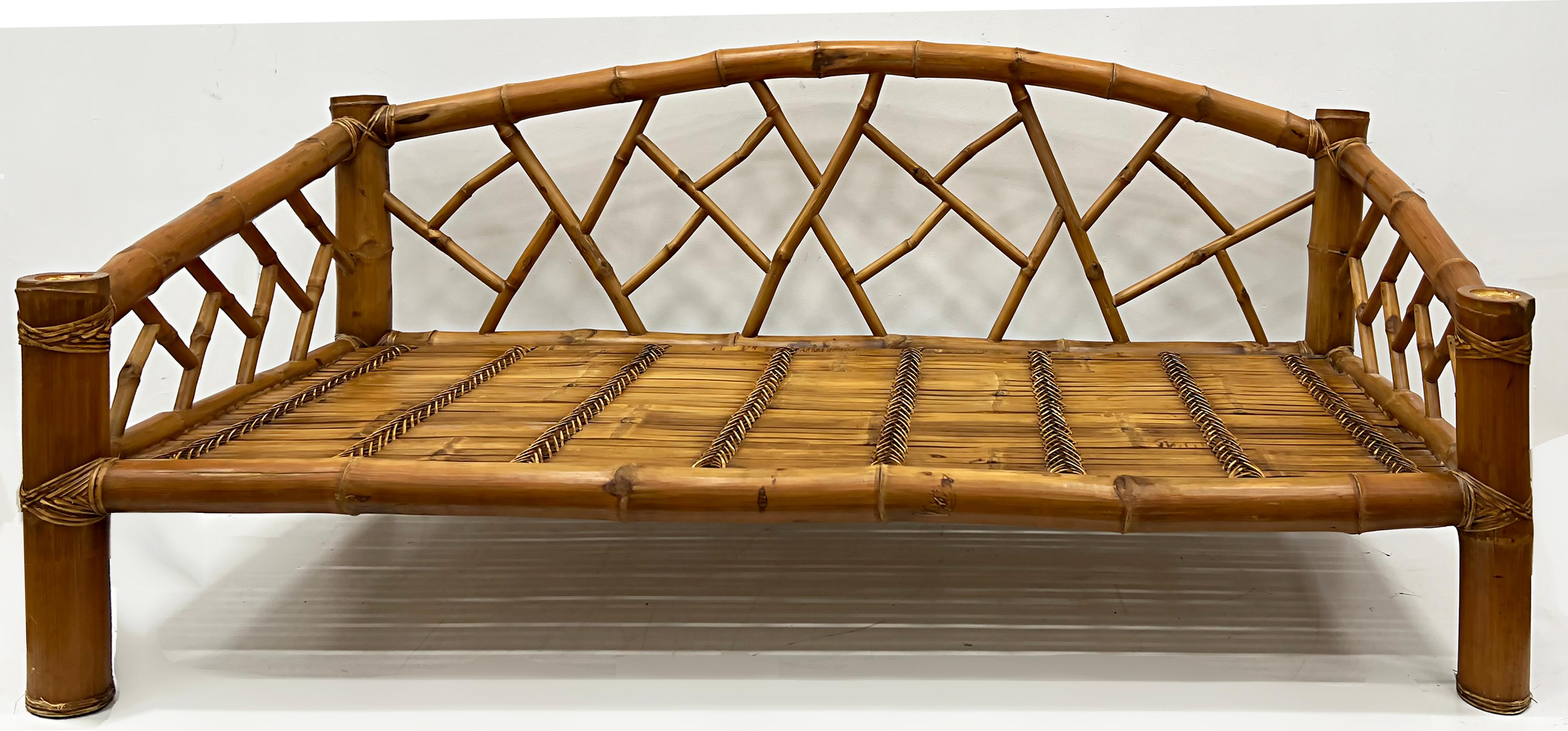 1987 Coastal bamboo rattan sofa by Antonio Budji Layug

Offered for sale is a 1987 bamboo sofa with rattan accents by Antonio Budji Layug. This sofa is dramatic and sculptural. The scale of the materials makes it quite substantial. The sofa was