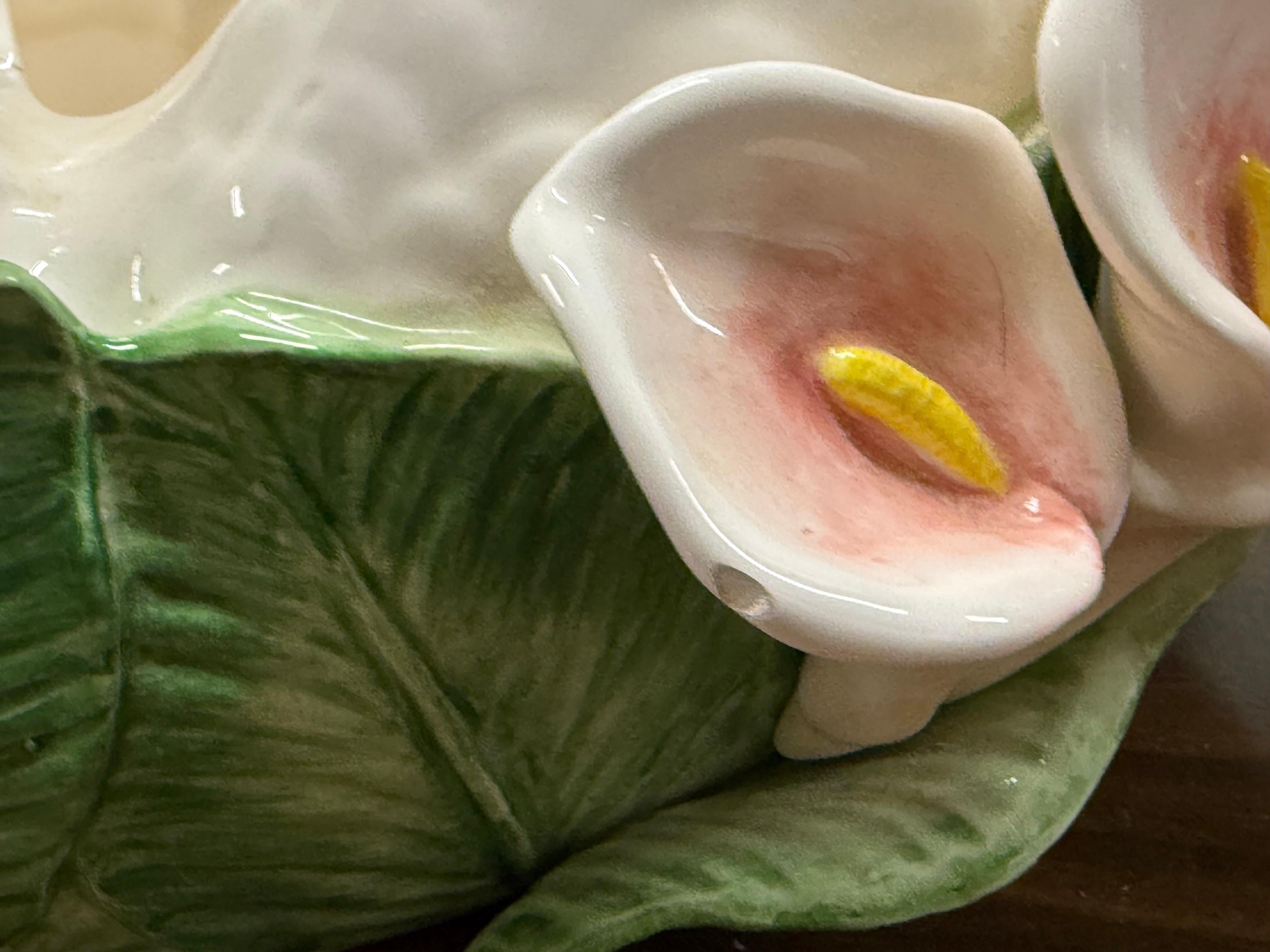 Rare design Fitz and Floyd planter with applied Calla Lillies.  Marked on the bottom and dated 1986