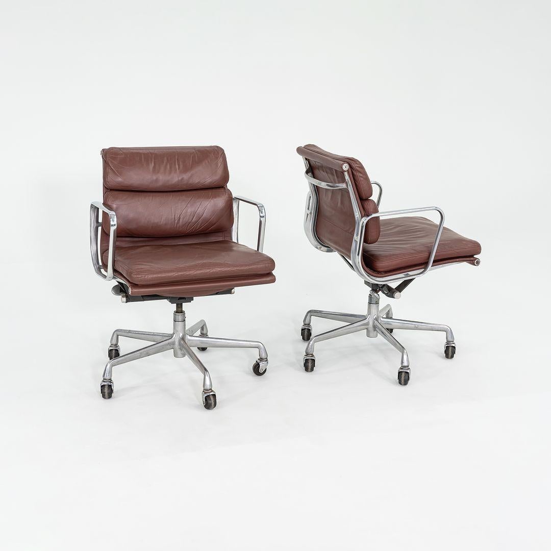 These are Eames Aluminum Group Soft Pad Management Chairs, Model EA435, initially designed by Charles and Ray Eames for Herman Miller in 1969. The listed price includes one desk chair, and we have seven chairs available for purchase in this