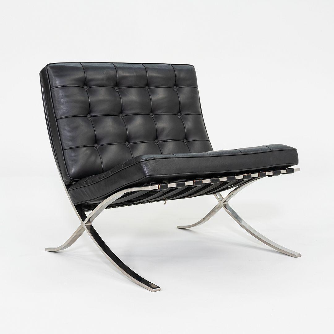 This is a Barcelona Lounge Chair, model 250LS, initially designed by Mies van der Rohe and Lilly Reich in 1929. This example was produced by Knoll in the United States in 1987. It features a solid, hand-polished stainless-steel frame (vs. the more