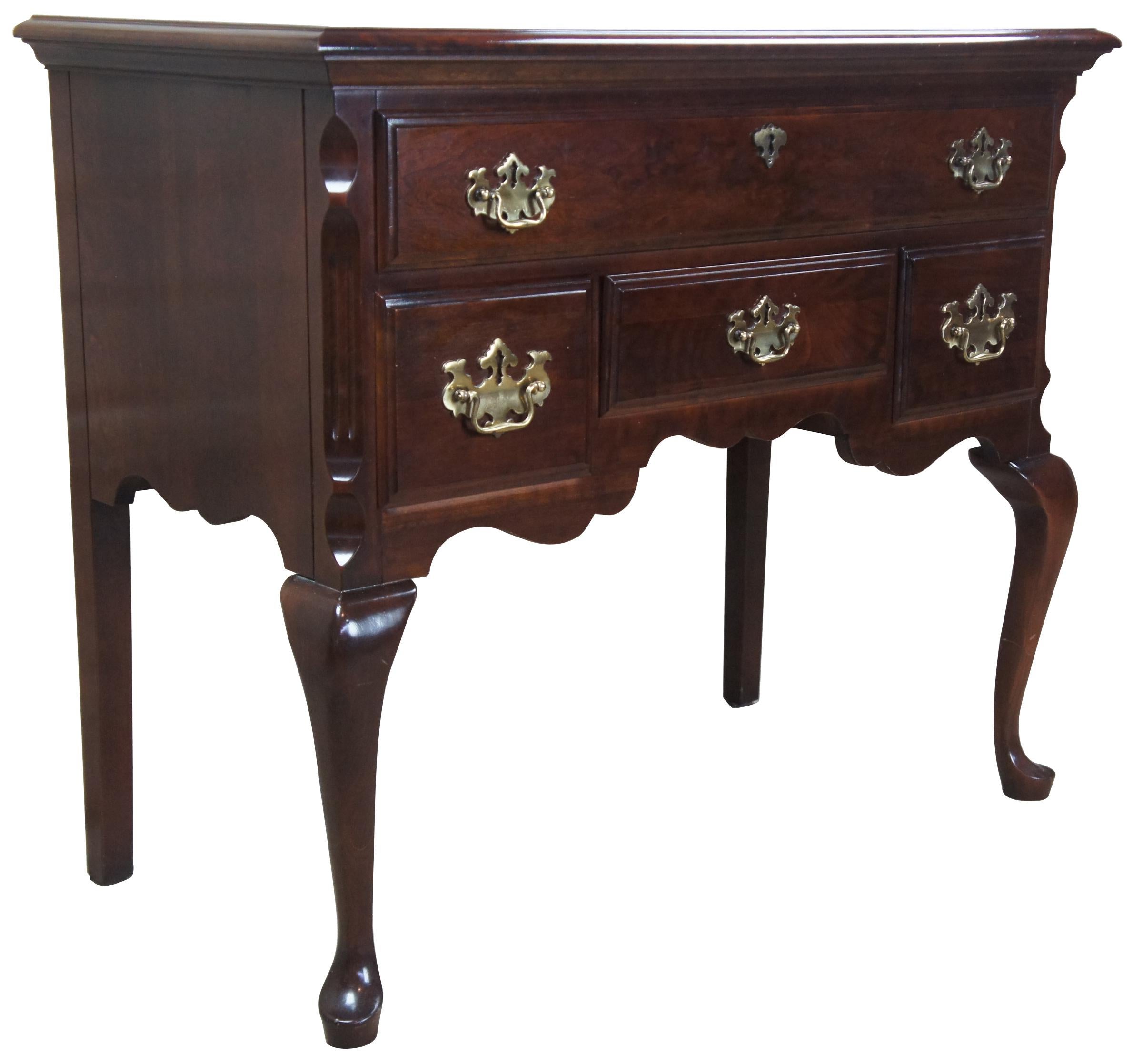 Penn House Indpendance Hall lowboy buffet or server item # 11-1581, circa 1987. Features Queen Anne styling with cabriole legs and pad feet. includes four drawers, dovetailed construction and brass hardware.
  