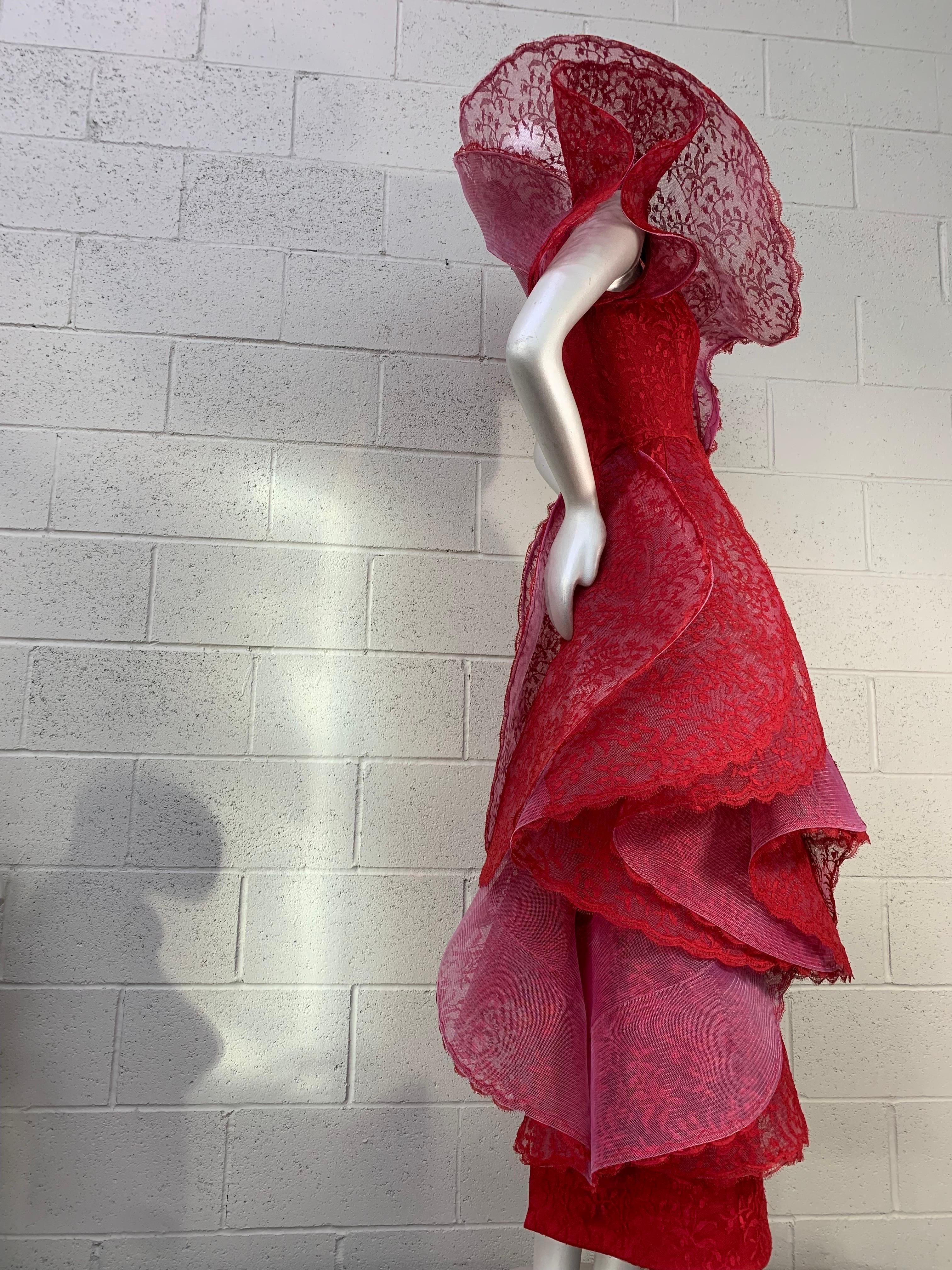 Pierre Cardin Haute Couture Tiered Flounce Lace Dress, 1987:

Haute Couture red lace dress with tiered pink synthetic crinoline flounces around the neckline and cascading down the body, and center back zipper closure.

Known primarily for his