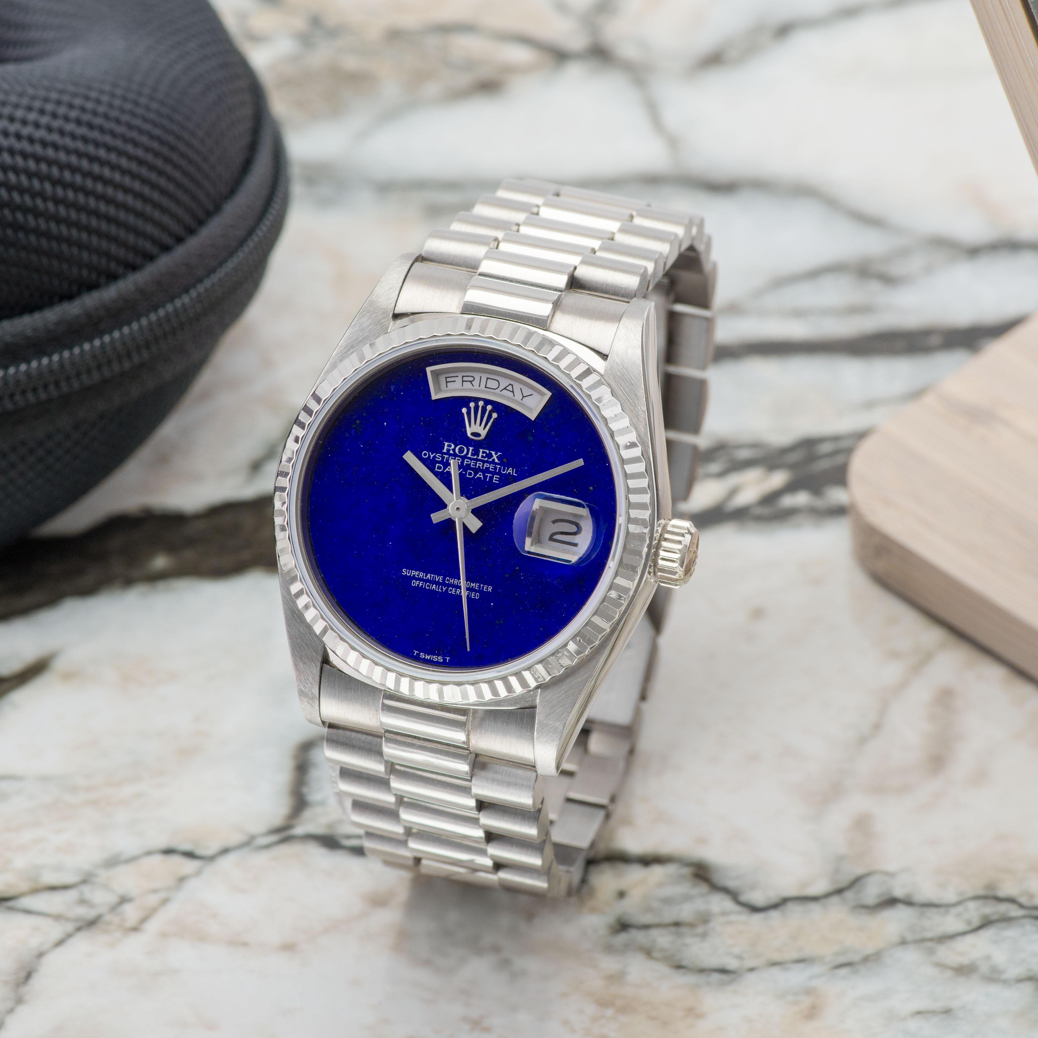 Lapis Day-Date in White Gold

Take a moment if you need to reread the title—you read it correctly. While it might seem like a familiar concept, something about it feels unexpectedly special. We understand.

Before diving into the watch, let me share