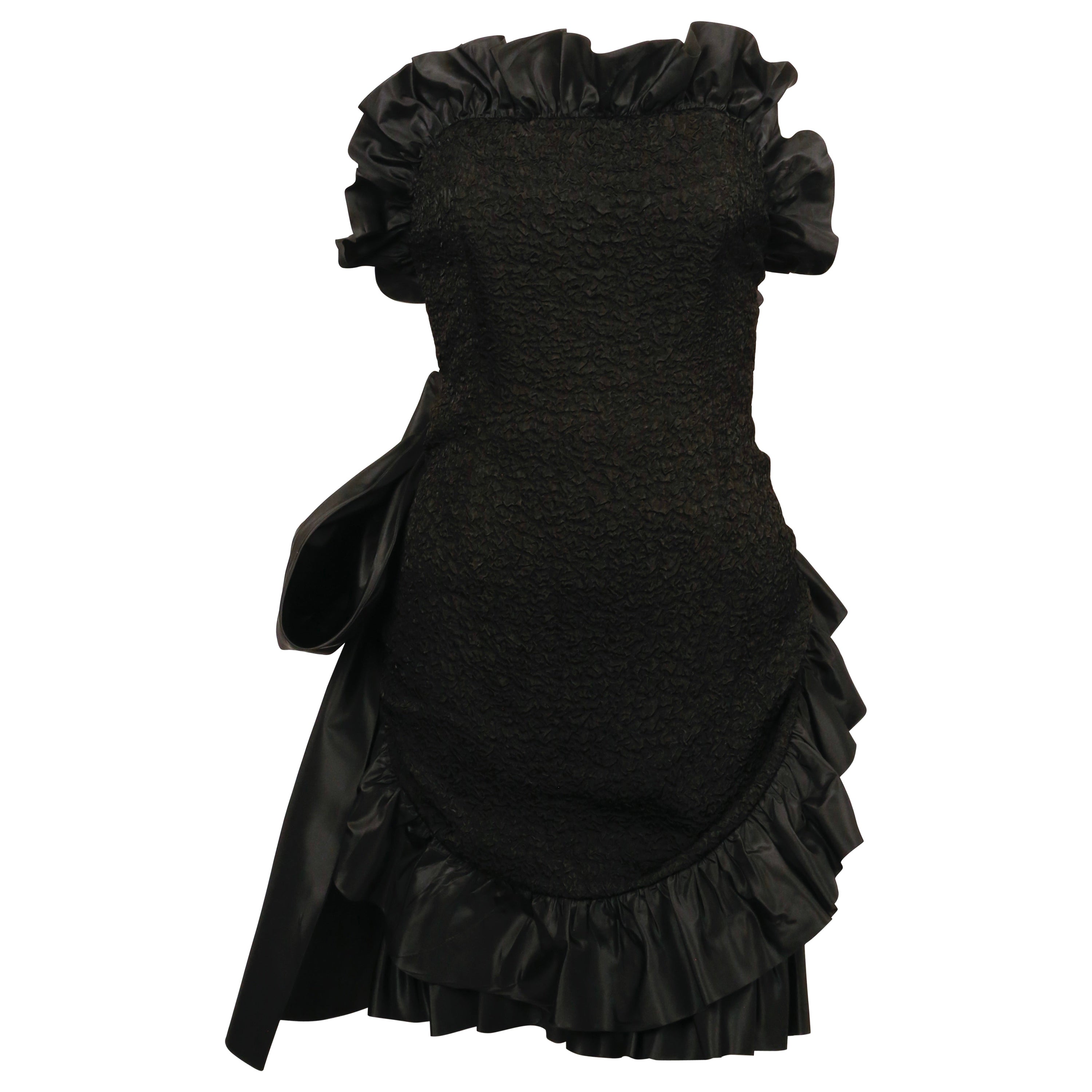 1987 YVES SAINT LAURENT vestido negro de tirantes con volantes y lazo Negro en venta