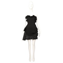 1987 Yves Saint Laurent, abito nero senza spalline con volant e fiocco