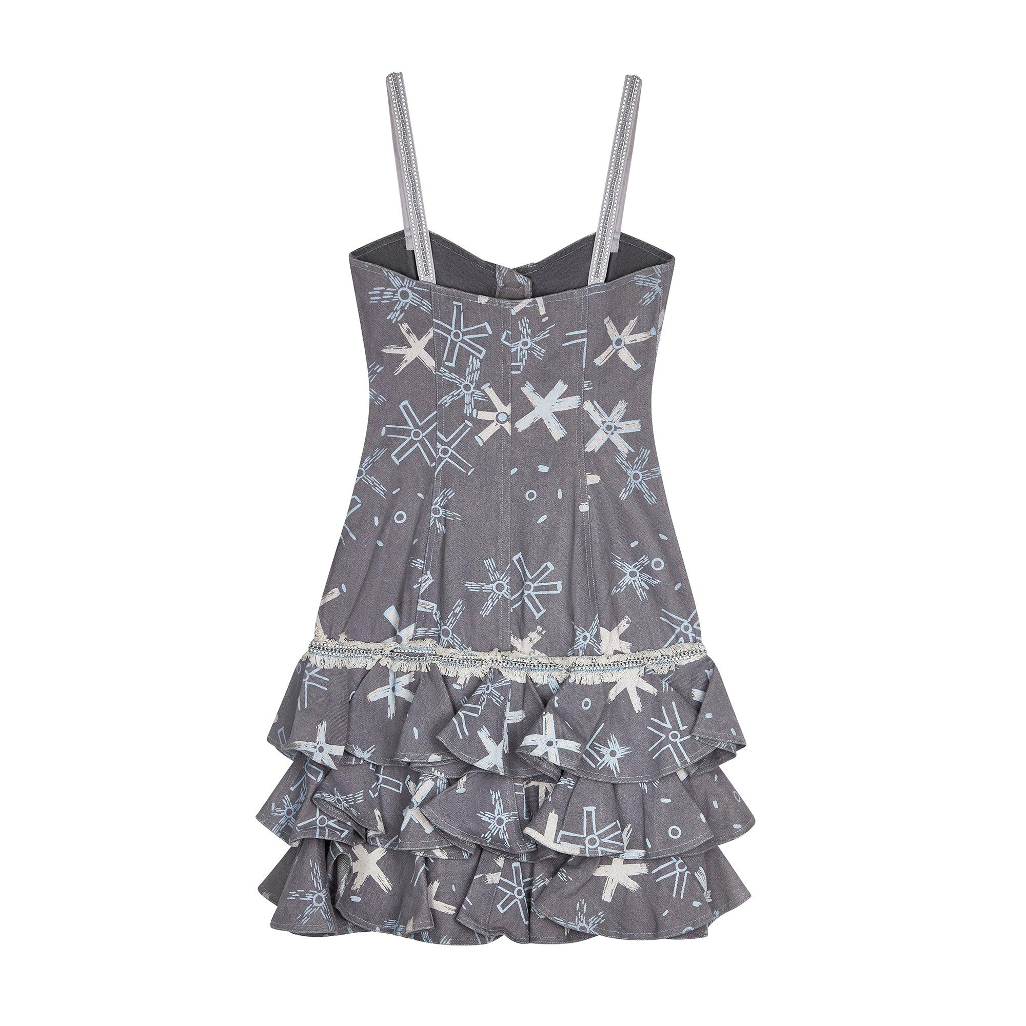 Zandra Rhodes is a British institution. Rising to fame as a fashion and textile designer in the 1970s, her audacious, highly feminine designs put her at the forefront of the London fashion scene. This denim mini-dress can be attributed to Rhodes’