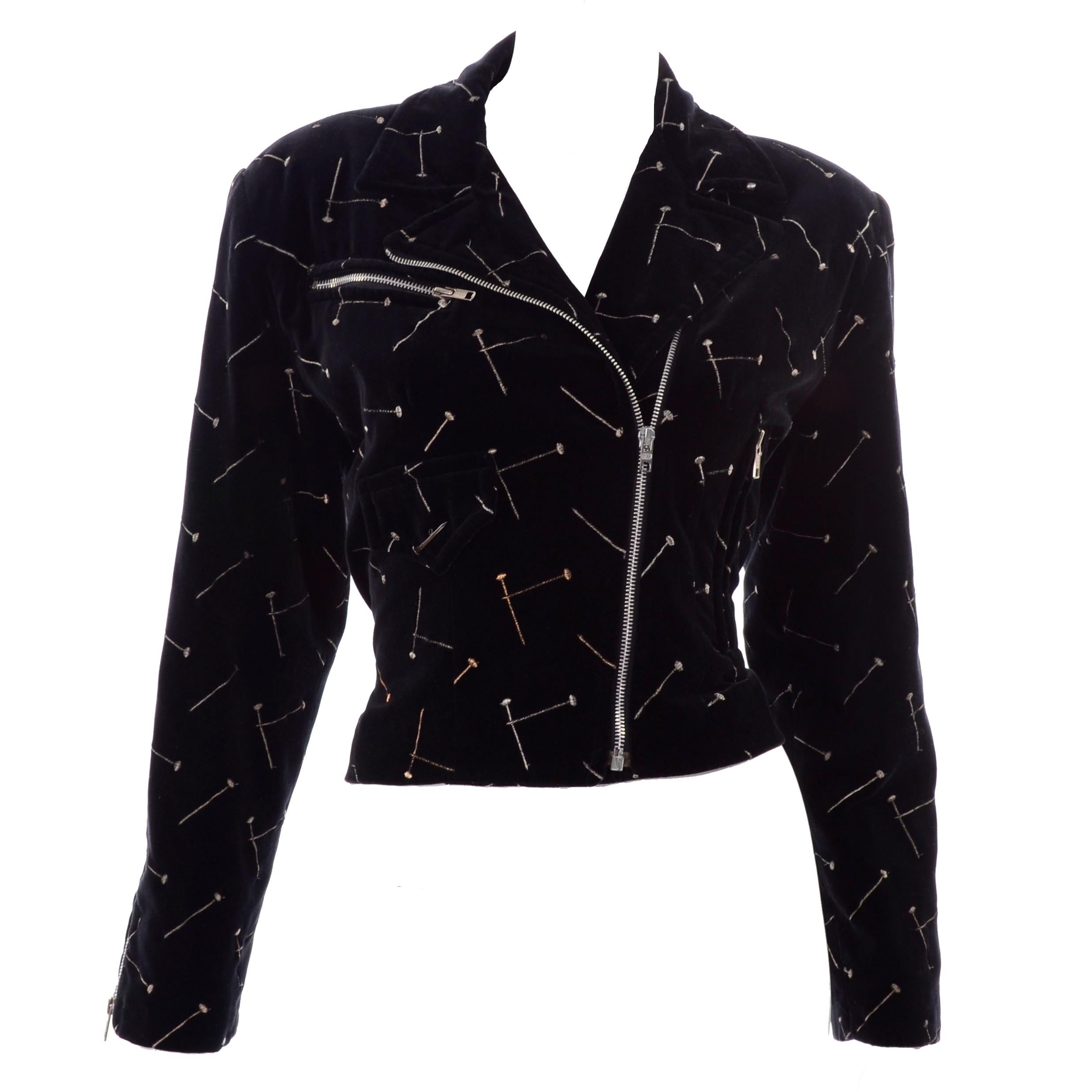 We love Patrick Kelly and this wonderful jacket  is a great example of his sense of humor and sense of style!  This 1988 fall/winter Patrick Kelly Paris black jacket has gold and silver nails embroidered on it with an actual metal nail on the faux