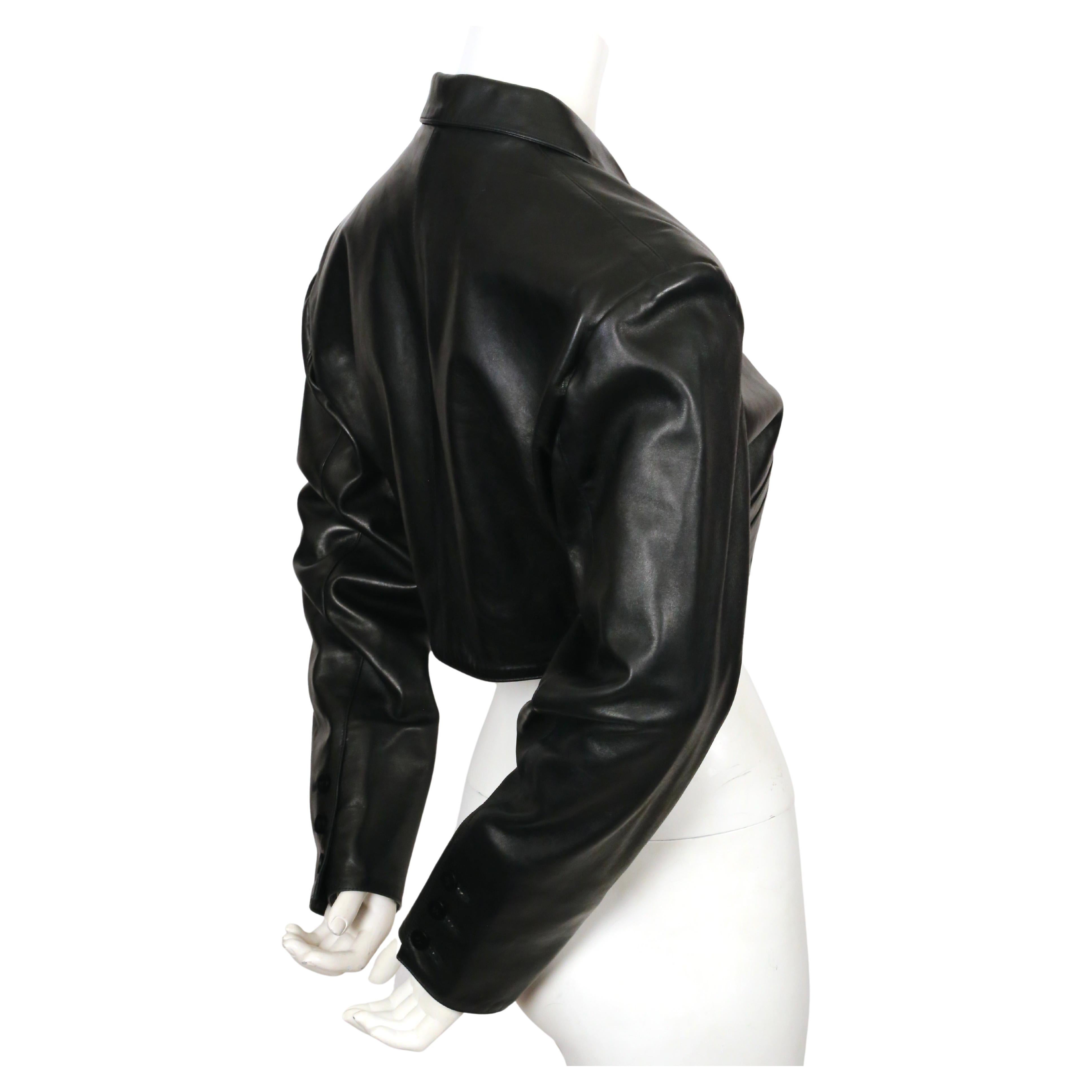 Black 1988 AZZEDINE ALAIA cropped black leather jacket with curved pockets For Sale