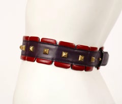 1988 AZZEDINE ALAIA red and purple leather RUNWAY belt with brass pyramid studs