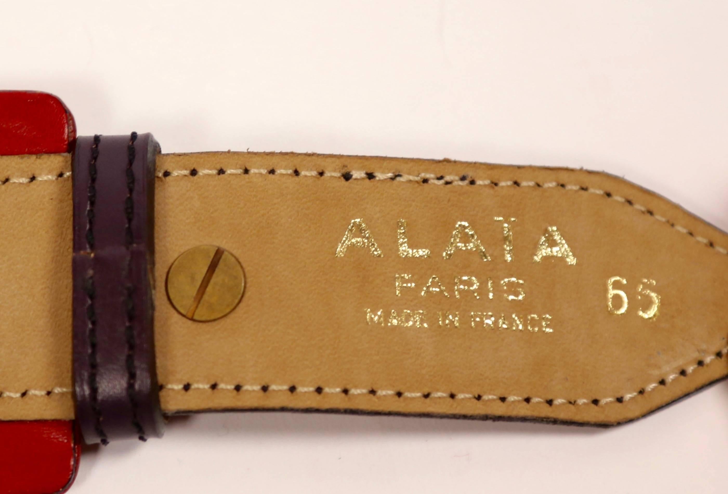 Women's or Men's 1988 AZZEDINE ALAIA red and purple leather RUNWAY belt with brass pyramid studs For Sale