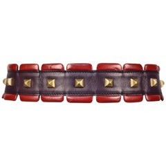 1988 AZZEDINE ALAIA red and purple leather RUNWAY belt with brass pyramid studs